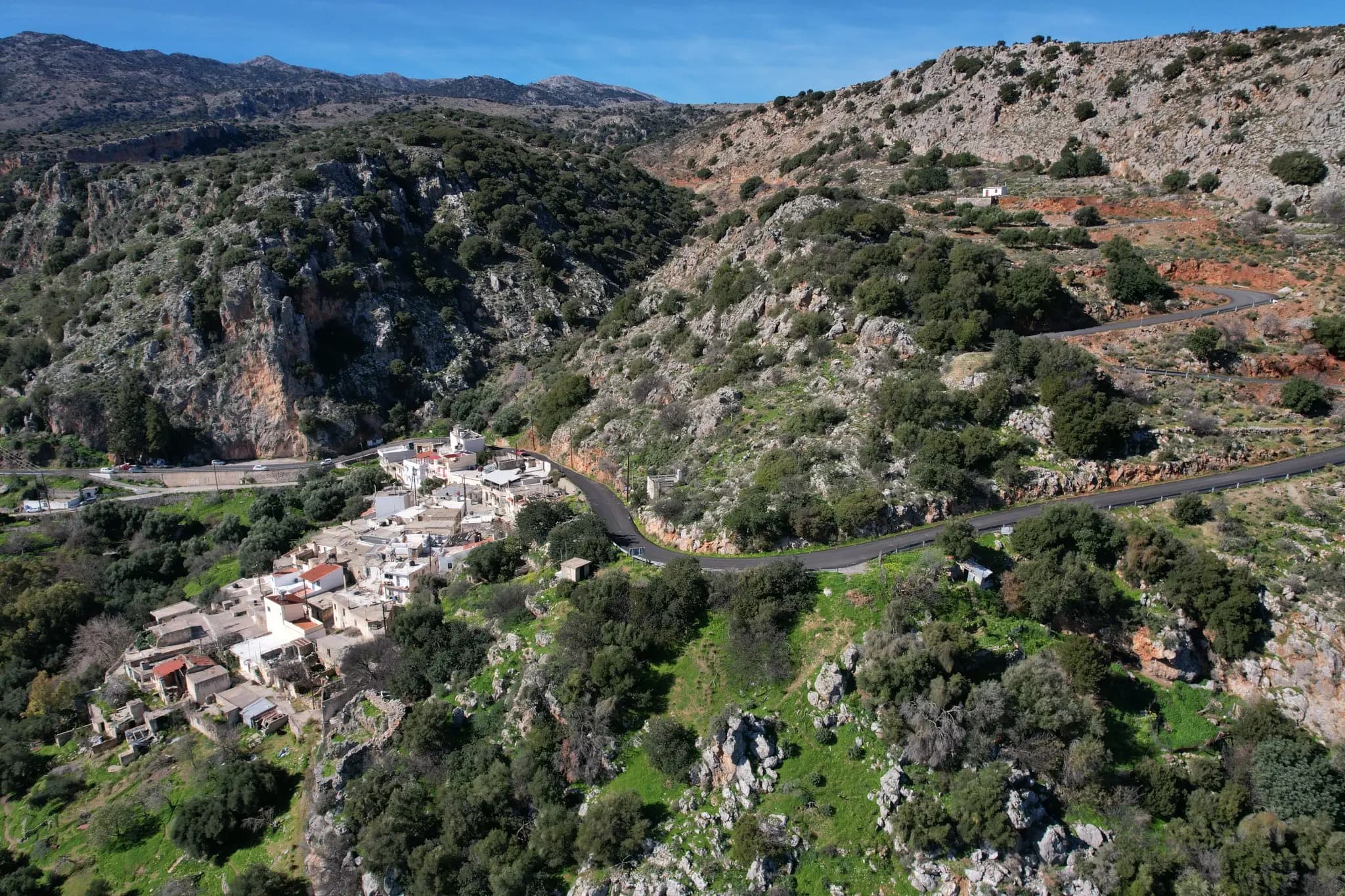 Aerial view of the rocky Próvarma hillside and access road above Kritsa